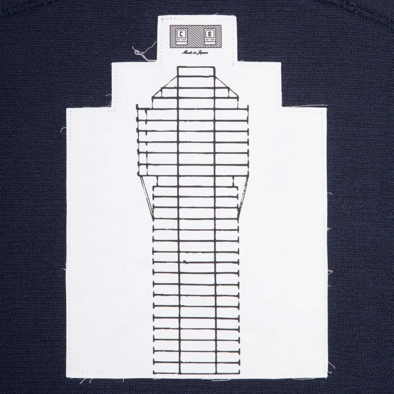 CAV EMPT 하프 버튼 업 니트 스웨터
